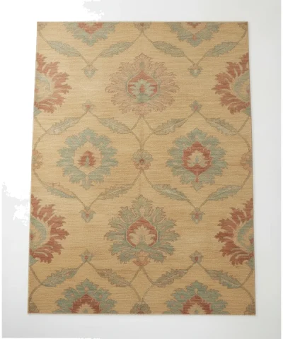 {image_id: provided_image_id, image_type: actual_product_photo, alt_text: Rectangular Kilim rug with an allover floral pattern in muted gold, terracotta, and teal, displayed on a white floor.}
