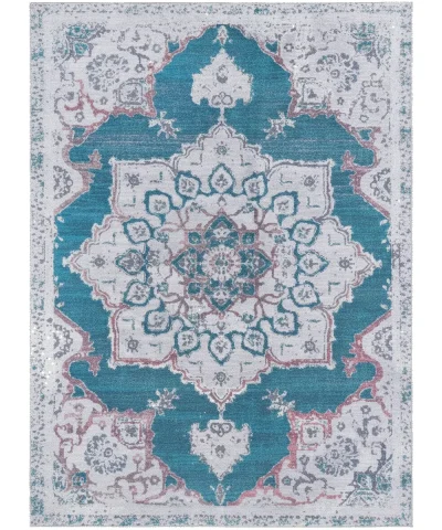 {image_id: main_image, image_type: actual_product_photo, alt_text: Francesca modern washable rug with a blue and white distressed medallion pattern}